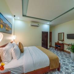 Отель M2Luxe The Lake Hoian комната для гостей