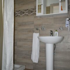 Апартаменты Nikos Apartments ванная