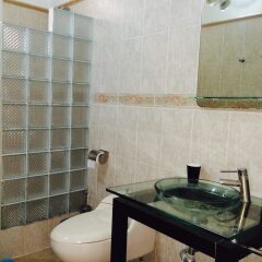 Апартаменты Apartment With 2 Bedrooms in Boca Chica, With Pool Access, Furnished T ванная