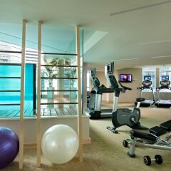 Отель Ascott Raffles Place Singapore фитнесс-зал