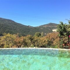 Villa Badem by Akdenizvillam Турция, Калкан - отзывы, цены и фото номеров - забронировать отель Villa Badem by Akdenizvillam онлайн бассейн