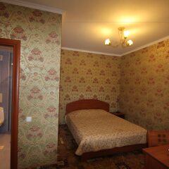 Гостиница Страна магнолий комната для гостей фото 9