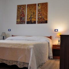 Отель B&B La Casetta in Canada Базилиано комната для гостей фото 2