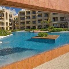 Отель Encanto El Faro Luxury Ocean Front Condo Hotel Мексика, Плая-дель-Кармен - отзывы, цены и фото номеров - забронировать отель Encanto El Faro Luxury Ocean Front Condo Hotel онлайн бассейн фото 2