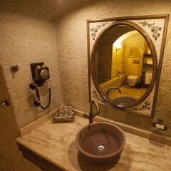 Отель Kayakapi Premium Caves Cappadocia ванная