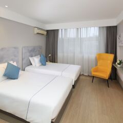 Отель Magnotel Chengdu Taikoo Li Dong Feng Bridge комната для гостей