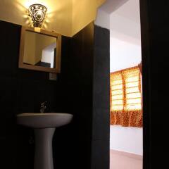 Отель Blue Reef Sport and Fishing Lodge & Bungalows ванная фото 2
