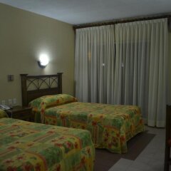 Plaza Palenque Hotel & Convention Center комната для гостей фото 3