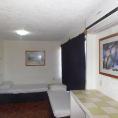 Отель Ikaro Suites Cancun Мексика, Канкун - отзывы, цены и фото номеров - забронировать отель Ikaro Suites Cancun онлайн интерьер отеля фото 3