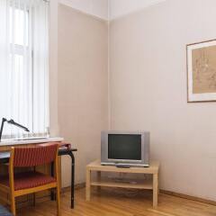Отель Central Riga Apartment Латвия, Рига - отзывы, цены и фото номеров - забронировать отель Central Riga Apartment онлайн комната для гостей фото 2