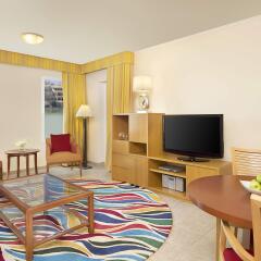 Апартаменты Marriott Executive Apartments Green Community комната для гостей