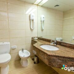Отель Rolla Residence Hotel Apartment ОАЭ, Дубай - отзывы, цены и фото номеров - забронировать отель Rolla Residence Hotel Apartment онлайн ванная