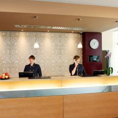 NH Zürich Airport Hotel интерьер отеля