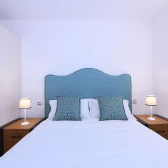 Апартаменты Amalfitano Apartments комната для гостей