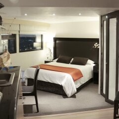 Aztic Hotel & Suites Ejecutivas сейф в номере