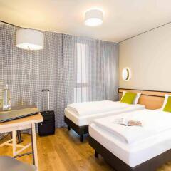 Отель Aparthotel Adagio access München City Olympiapark Германия, Мюнхен - 4 отзыва об отеле, цены и фото номеров - забронировать отель Aparthotel Adagio access München City Olympiapark онлайн комната для гостей фото 2