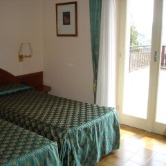 Отель Albergo Ristorante Carenno Италия, Каренно - отзывы, цены и фото номеров - забронировать отель Albergo Ristorante Carenno онлайн комната для гостей фото 2