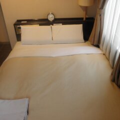 Отель Hospitality In Yawatajuku Камагая комната для гостей фото 3