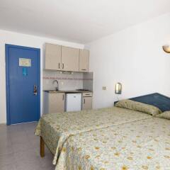Отель Apartamentos Central City в номере фото 2