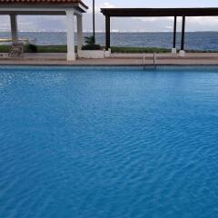 Отель Sunrise Villa On The Beach бассейн