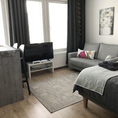 Апартаменты The Harbour Apartments Ювяскюля комната для гостей
