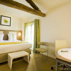 Отель Holiday Inn Paris Opéra Grands Boulevards комната для гостей фото 5