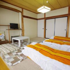 Отель Hakuba Ski Kan Хакуба комната для гостей