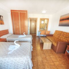 Отель Apartamentos Levante Club Испания, Пляж Леванте - отзывы, цены и фото номеров - забронировать отель Apartamentos Levante Club онлайн комната для гостей