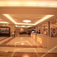 Отель Jiu Zhou Guo Ji Hotel Китай, Цзиндэчжэнь - отзывы, цены и фото номеров - забронировать отель Jiu Zhou Guo Ji Hotel онлайн вестибюль