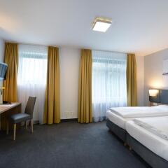 GHOTEL hotel & living Hannover 3* Улучшенный номер с различными типами кроватей фото 2