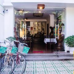 Отель Flower Garden Homestay Хойан гостиничный бар