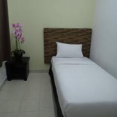 Отель Ar-Raudhah Suites and Hotel Малайзия, Пенанг - отзывы, цены и фото номеров - забронировать отель Ar-Raudhah Suites and Hotel онлайн комната для гостей