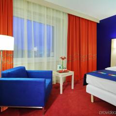 Гостиница Park Inn by Radisson Пулковская комната для гостей фото 5