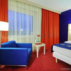 Park Inn by Radisson Pulkovskaya Hotel & Conference Centre St Petersburg в Санкт-Петербурге - забронировать гостиницу Park Inn by Radisson Pulkovskaya Hotel & Conference Centre St Petersburg, цены и фото номеров Санкт-Петербург комната для гостей фото 5