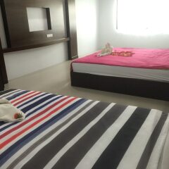 Апартаменты Poonsap Apartment Ланта комната для гостей фото 4