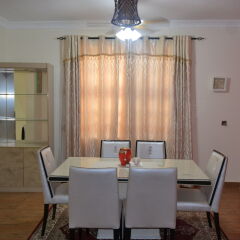 Отель Shenocho Properties в номере