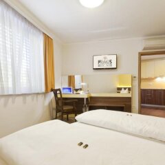 Отель Primus Hotel & Apartments Австрия, Вена - отзывы, цены и фото номеров - забронировать отель Primus Hotel & Apartments онлайн комната для гостей фото 5
