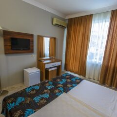 Litore Resort Hotel & Spa Турция, Окурджалар - отзывы, цены и фото номеров - забронировать отель Litore Resort Hotel & Spa - All Inclusive онлайн удобства в номере