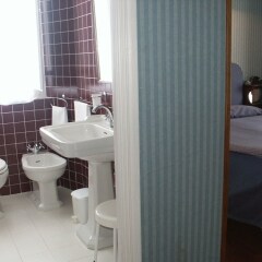 Hotel Gattapone Сполето ванная
