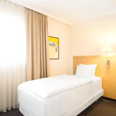 NH Zürich Airport Hotel комната для гостей