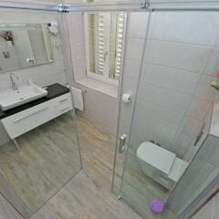 Отель Nirvana Luxury Rooms ванная фото 2