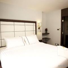 Отель Sukhumvit Suites Бангкок комната для гостей фото 2