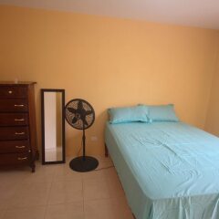 Отель Belaire Vacation Home сейф в номере