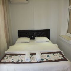 Отель Taksim 9 Suites сейф в номере