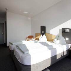 Отель DJH City-Hostel Köln-Riehl Германия, Кёльн - отзывы, цены и фото номеров - забронировать отель DJH City-Hostel Köln-Riehl онлайн комната для гостей фото 3