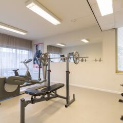 Отель New West Inn фитнесс-зал фото 4