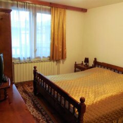 Отель Boyadjiyski Guest House Банско комната для гостей