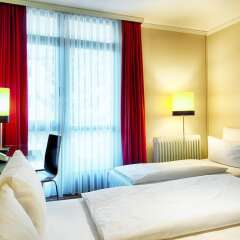 Leonardo Hotel & Residenz München комната для гостей фото 8