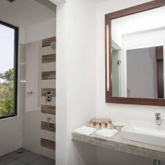 Отель The Calm Resort & Spa ванная