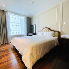Отель M Suites by S Home Хошимин комната для гостей фото 2